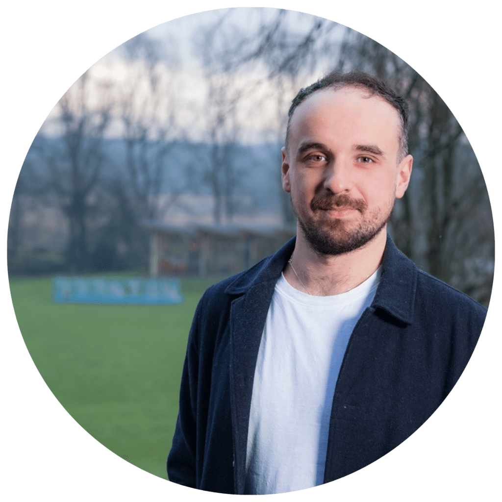 Luke Beardsworth, Director at Alma, is facing the camera. Out of focus is Avenham Park.